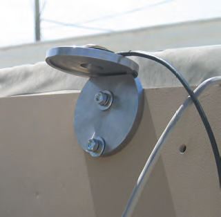 Close up of the antenna mount bracket attached to a vehicle, one of the many parts the MPH provides.