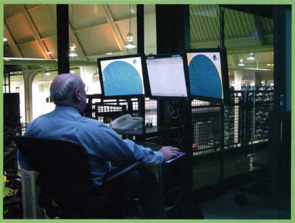 stan Stan Kolish, regional manager of Alion Science and Technology, at one of the C3 workstations.