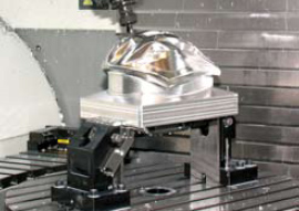 The Kurt 5-axis clamping system allowsfor the larger head clearance required on large5-axis machines.Photo courtesy of Kurt Manufacturing Company.