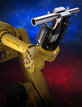 Grip-Gage-Go solution from Control Gaging Inc., two standard gages are attached to a robot gripper. They measure the part diameter in two places as the part is being handled. This takes the place of a separate gage station and saves the time that would be required to load/unload the part from a gage station.