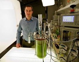 Harrison Dillon, president and chief technology officer of Solazyme, with their bioreactor.